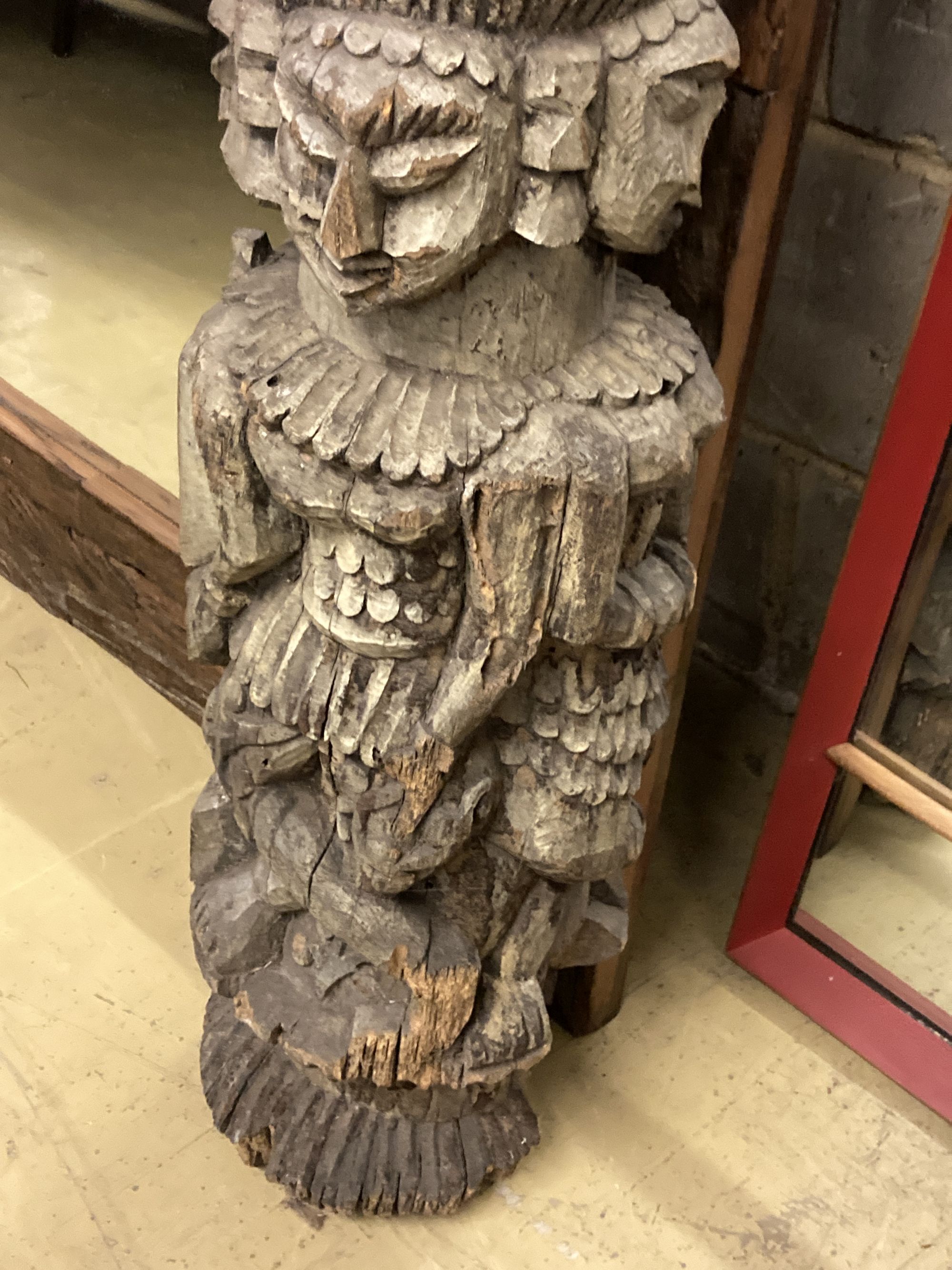 A South East Asian carved column, 90cm high